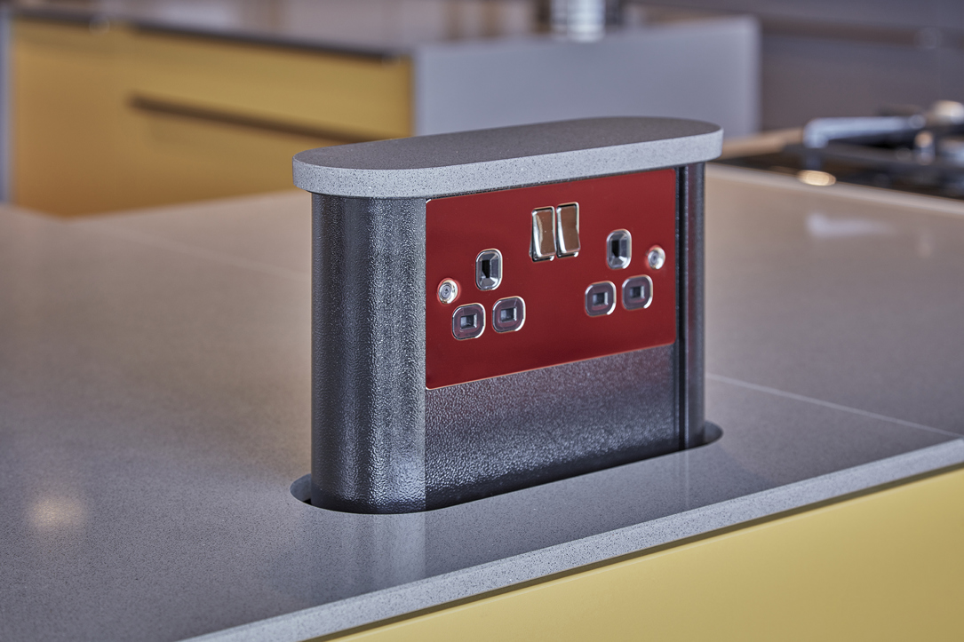 Motorised pop-up socket