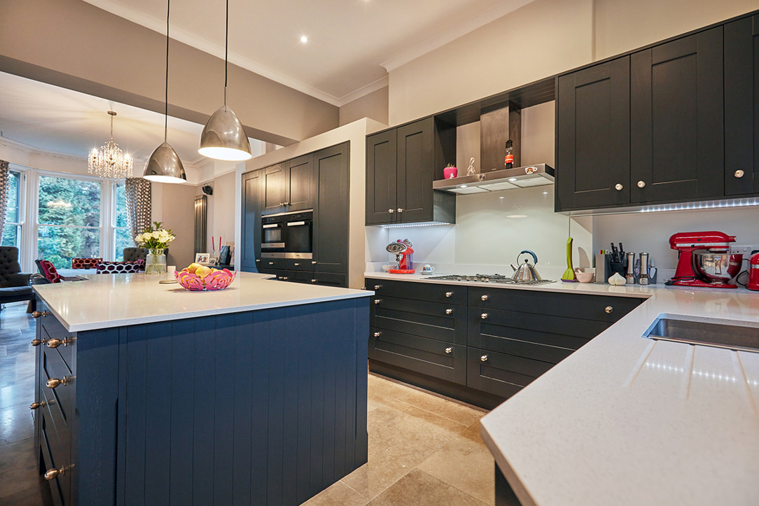 Navy shaker kitchen with quartz worktops