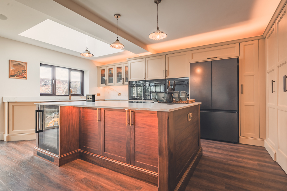 Cream Shaker kitchen with a solid walnut island in a Horsforth home in Leeds
