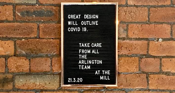 Wall sign: 'Great Design Will Outlive Covid 19'